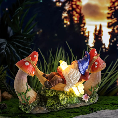 Solar Gnome Figurine Lying on Hammock with Bird and Mushroom